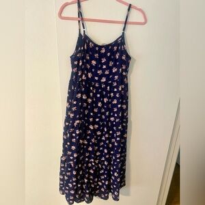 Tea length flowy floral dress with adjustable spaghetti straps